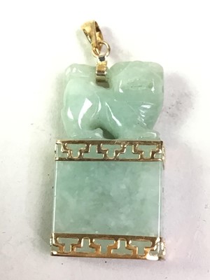 Lot 7 - FOUR CHINESE HARDSTONE AND GOLD PENDANTS