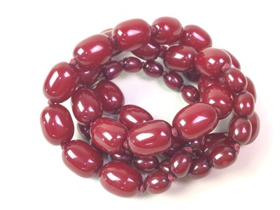 Lot 15 - CHERRY AMBER COLOURED BEAD NECKLACE