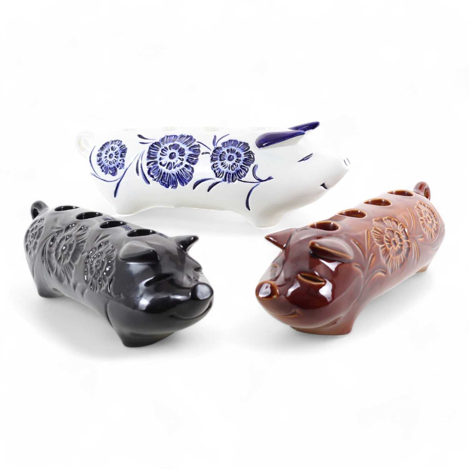 Lot 1374 - BESWICK, THREE CANDLE HOLDERS MODELLED AS PIGS