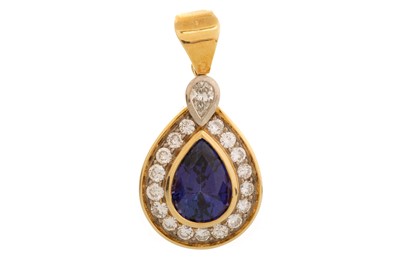 Lot 398 - TANZANITE AND DIAMOND PENDANT