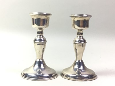 Lot 394 - PAIR OF GEORGE V SILVER CANDLESTICKS