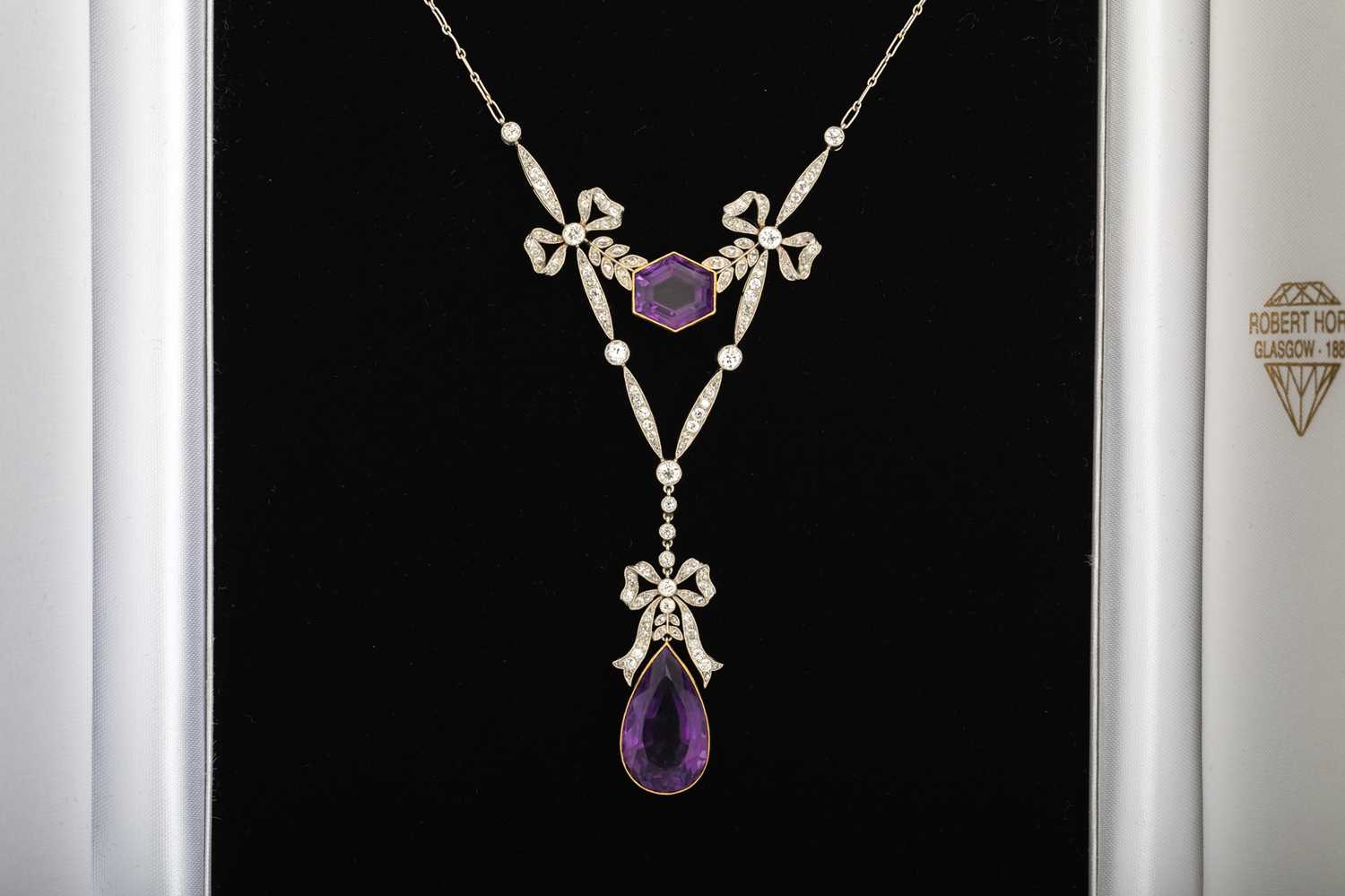 Lot FINE AMETHYST AND DIAMOND LAVALIERE NECKLACE