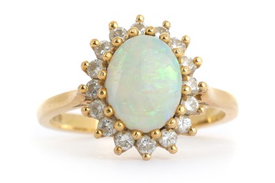 Lot 415 - OPAL AND DIAMOND CLUSTER RING