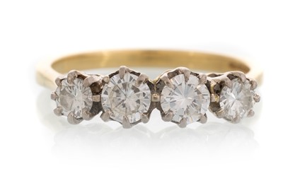 Lot 375 - DIAMOND FOUR STONE RING