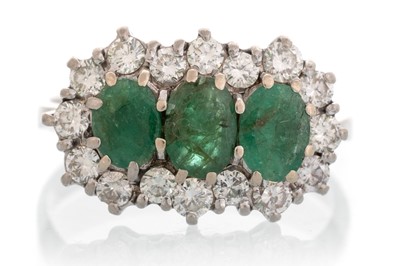 Lot 695 - EMERALD AND DIAMOND CLUSTER RING