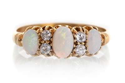 Lot 694 - OPAL AND DIAMOND RING