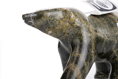 Lot 1451 - TOMMY TAKPANNIE SR. (CAPE DORSET, 1936-2013), INUIT SOAPSTONE CARVING OF A BEAR