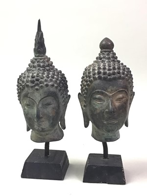 Lot 343 - PAIR OF BUDDHA HEAD ORNAMENTS