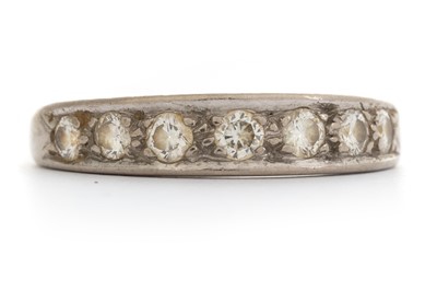 Lot 518 - DIAMOND SEVEN STONE RING