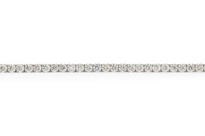 Lot 414 - DIAMOND TENNIS BRACELET