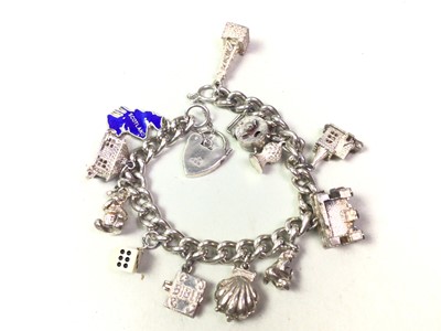 Lot 666 - SILVER CHARM BRACELET