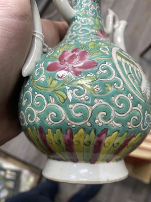 Lot 669 - CHINESE FAMILLE ROSE WINE EWER