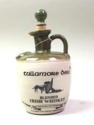 Lot 721 - THREE POTTERY WHISKY DECANTERS