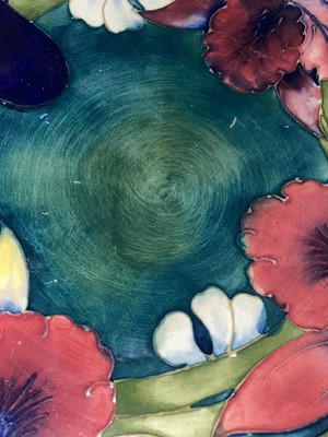 Lot 1657 - MOORCROFT, ORCHID PATTERN BOWL