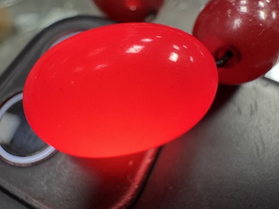 Lot 119 - THREE CHERRY AMBER BAKELITE BEAD NECKLACES