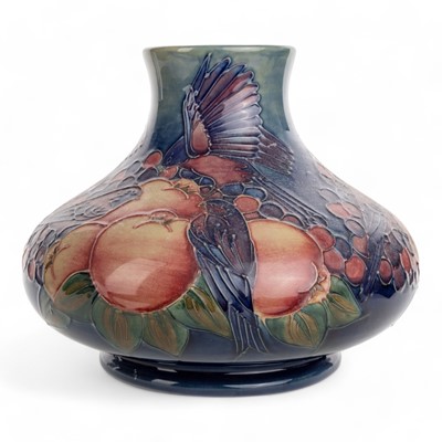 Lot 1670 - SALLY TUFFIN FOR MOORCROFT POTTERY, 'FINCHES AND FRUIT' PATTERN VASE