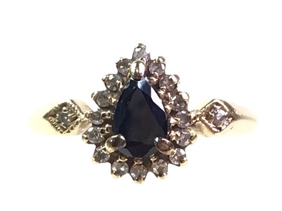 Lot 81 - NINE CARAT GOLD SAPPHIRE AND DIAMOND RING