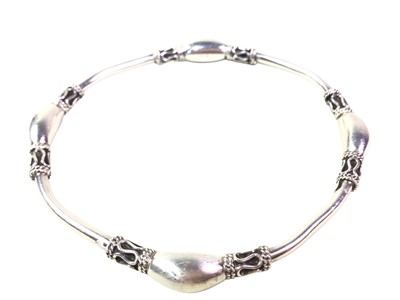 Lot 156 - FIVE SILVER BANGLES