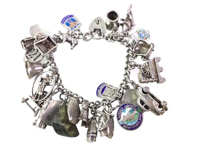 Lot 101 - SILVER CHARM BRACELET