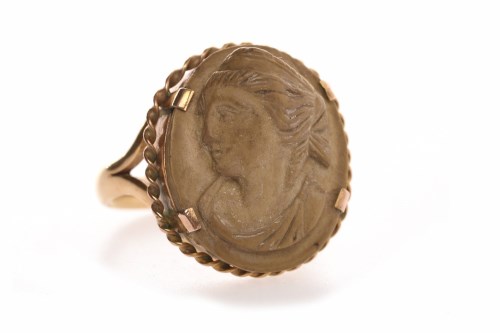Lot 37 - VICTORIAN LAVA CAMEO RING the large section of...