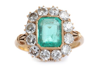 Lot 566 - EMERALD AND DIAMOND CLUSTER RING