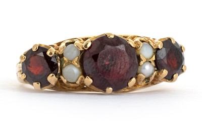 Lot 576 - GARNET AND PEARL RING