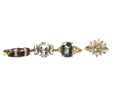 Lot 397 - FOUR GOLD DRESS STONE RINGS