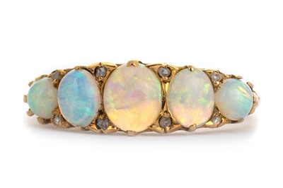 Lot 604 - OPAL AND DIAMOND RING