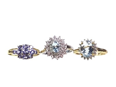 Lot 407 - FOUR DRESS RINGS