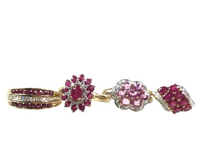 Lot 418 - FOUR DIAMOND AND RUBY COLOURED STONE DRESS RINGS