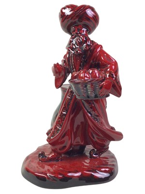 Lot 383 - ROYAL DOULTON FLAMBÉ FIGURE OF THE LAMP SELLER