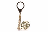 Lot 82 - GOLD KEYCHAIN with a decorative circular...