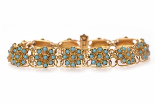 Lot 112 - HIGH CARAT GOLD TURQUOISE BRACELET formed by...