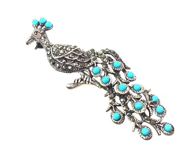 Lot 599 - STERLING SILVER PEACOCK BROOCH