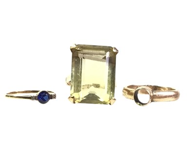 Lot 694 - THREE DRESS RINGS