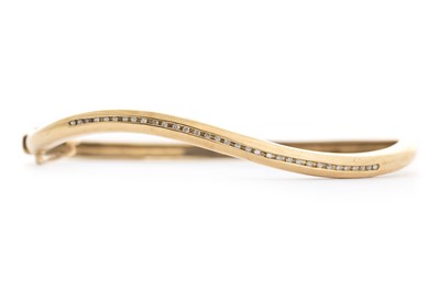 Lot 664 - DIAMOND SET BANGLE