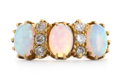 Lot 657 - OPAL AND DIAMOND DRESS RING