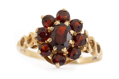 Lot 722 - GARNET CLUSTER RING