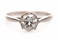 Lot 150 - DIAMOND SOLITAIRE RING set with a round...