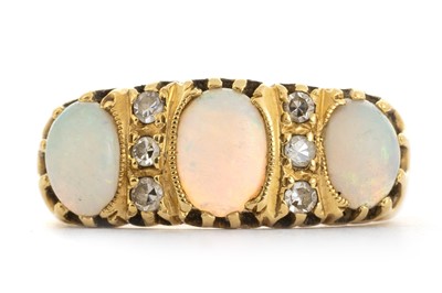 Lot 771 - OPAL AND DIAMOND RING