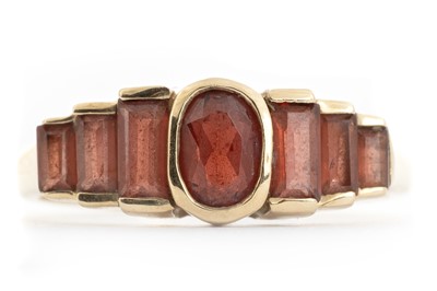 Lot 394 - GARNET DRESS RING