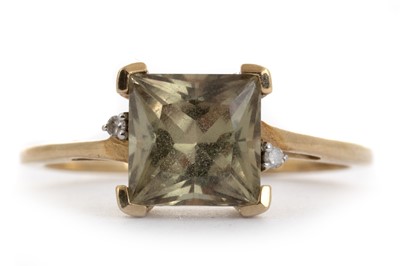 Lot 386 - TOPAZ AND DIAMOND RING