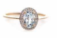 Lot 162 - AQUAMARINE AND DIAMOND RING set with a central...