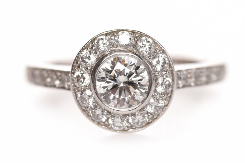 Lot 172 - EIGHTEEN CARAT WHITE GOLD DIAMOND RING with a...