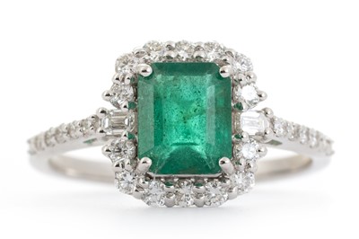 Lot 689 - EMERALD AND DIAMOND RING