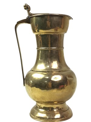 Lot 139 - BRASS WATER JUG