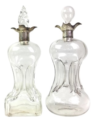 Lot 213 - NEAR PAIR OF SILVER COLLARD GLASS DECANTERS