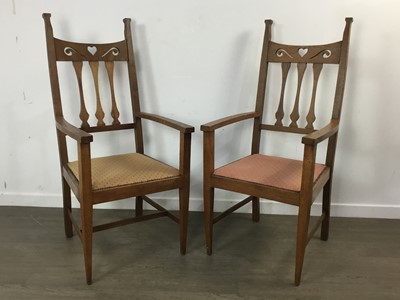 Lot 463 - IN THE MANNER OF C.F.A. VOYSEY, SET OF EIGHT ARTS & CRAFTS OAK DINING CHAIRS
