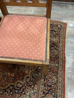 Lot 463 - IN THE MANNER OF C.F.A. VOYSEY, SET OF EIGHT ARTS & CRAFTS OAK DINING CHAIRS