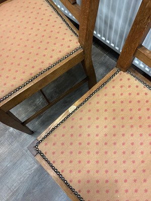 Lot 463 - IN THE MANNER OF C.F.A. VOYSEY, SET OF EIGHT ARTS & CRAFTS OAK DINING CHAIRS